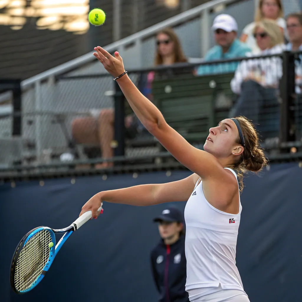 Emily serving the ball